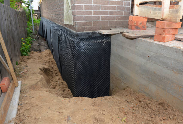 SJ Waterproofing Pros technician performing targeted Waterproofing assessment in Alexandria, KY